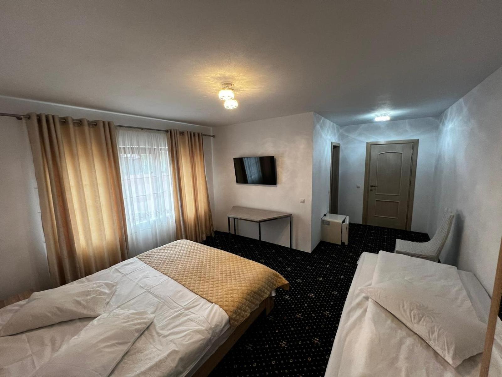 Hotel Casa Bujor De Munte Dragoslavele Esterno foto